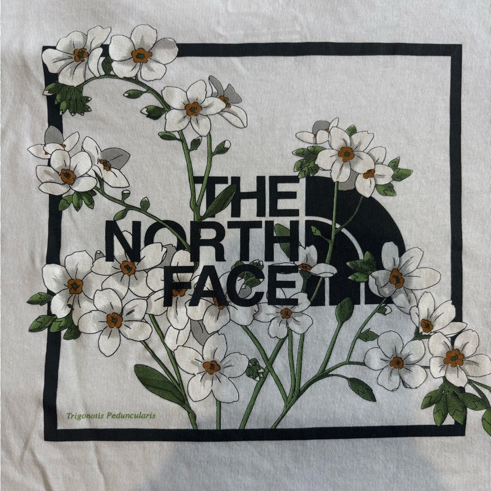 The North Face White Floral Logo Long Sleeve Tee with Green Accents